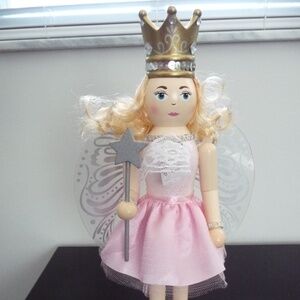 Wooden nutcracker ballerina pink clothing blond hair